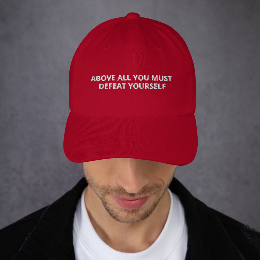 ABOVE ALL YOU MUST DEFEAT YOURSELF hat