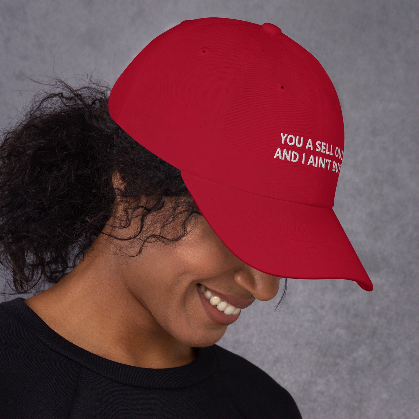 YOU A SELL OUT, AND I AIN’T BUYIN hat