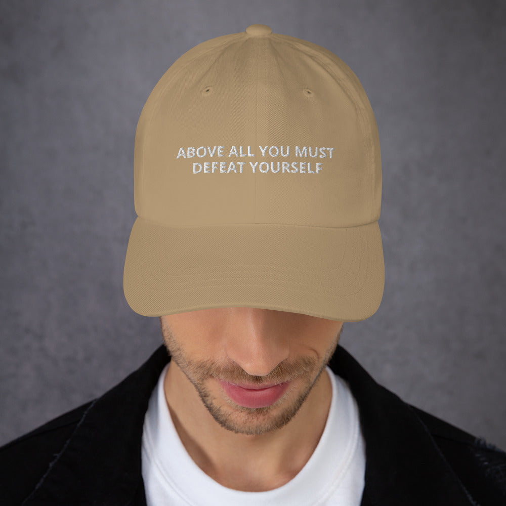 ABOVE ALL YOU MUST DEFEAT YOURSELF hat