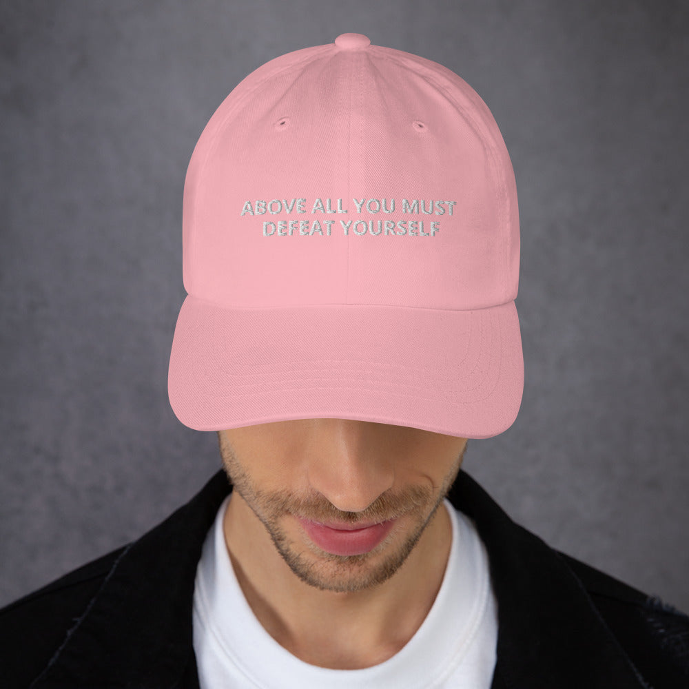ABOVE ALL YOU MUST DEFEAT YOURSELF hat