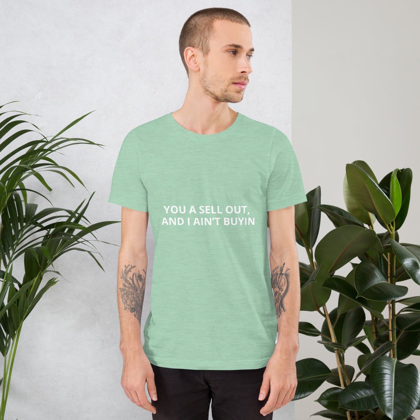 YOU A SELL OUT, AND I AIN’T BUYIN Unisex t-shirt