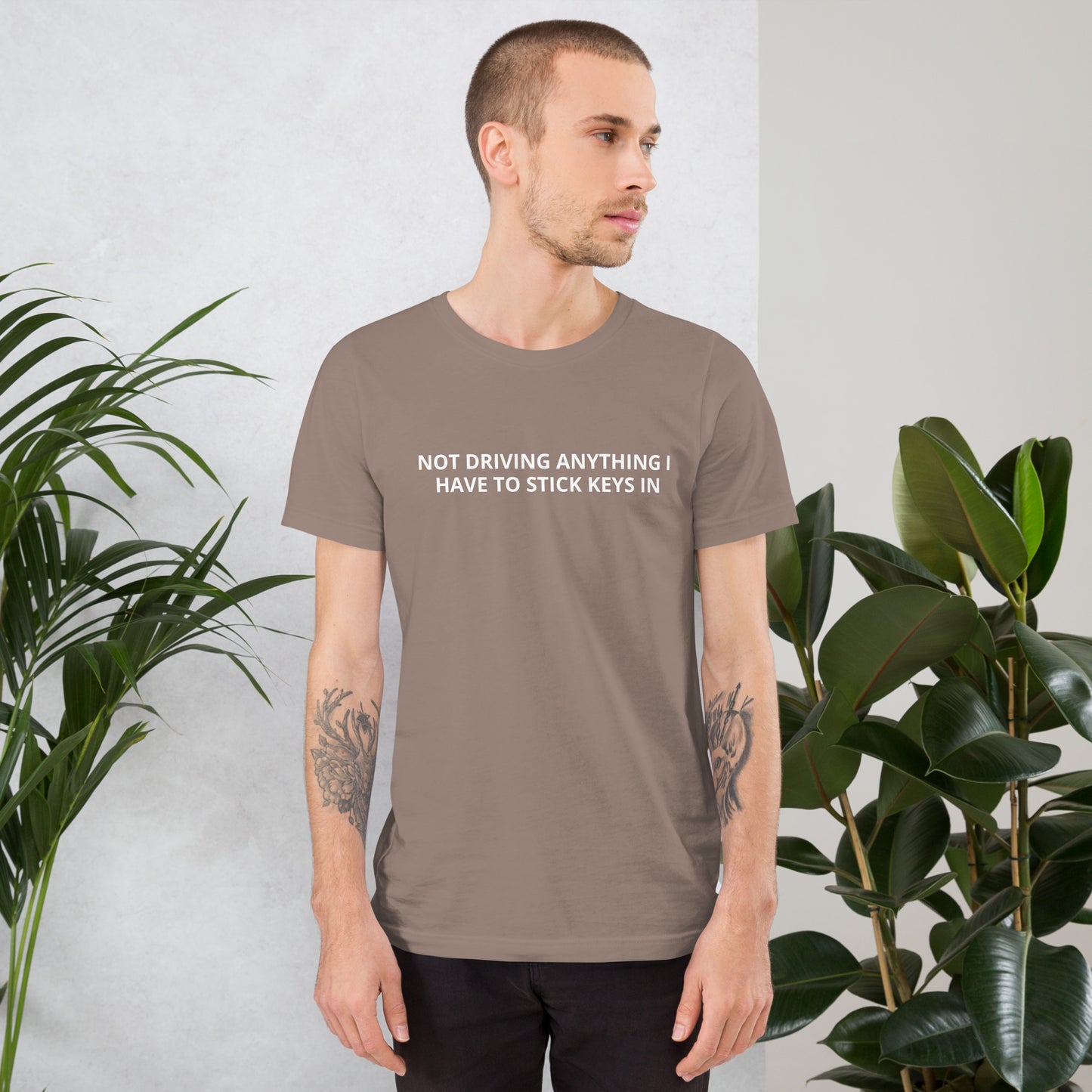 NOT DRIVING ANYTHING I HAVE TO STICK A KEY IN Unisex t-shirt