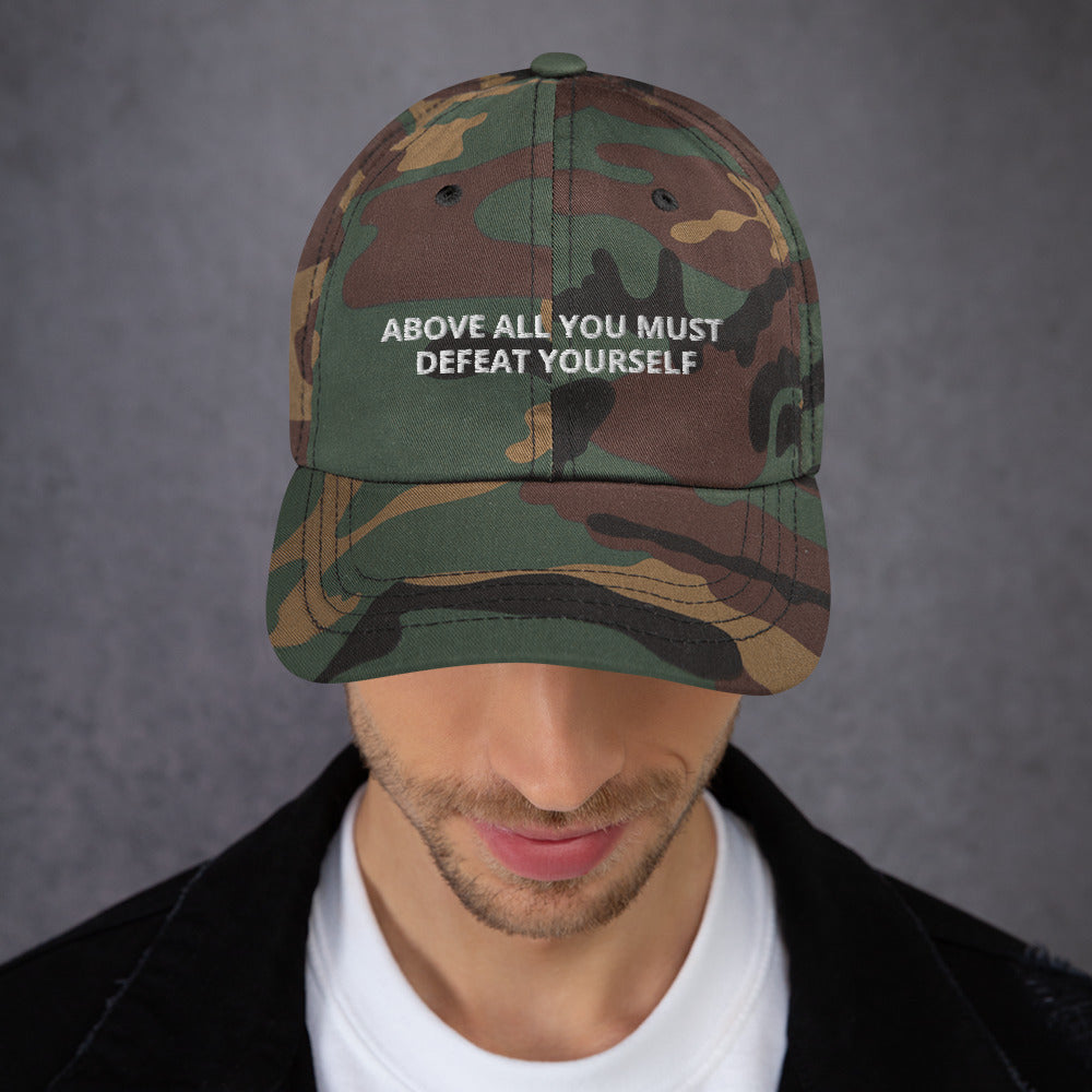 ABOVE ALL YOU MUST DEFEAT YOURSELF  hat